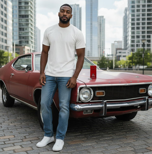 Paradime Enterprise LLC Ford Legacy Gran Torino EDT bottle on a vintage red car with a man in a white t-shirt