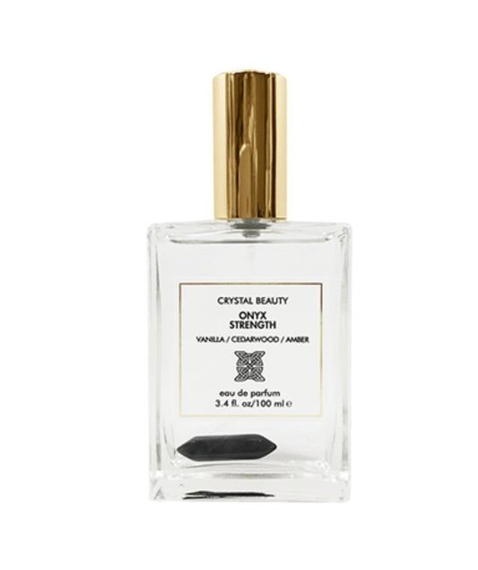 Paradime Enterprise LLC Crystal Beauty Onyx Strength perfume bottle with a black onyx crystal inside and gold cap.