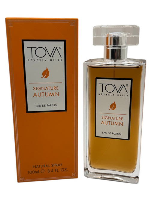 Paradime Enterprise LLC Tova Signature Autumn Eau de Parfum 3.4 oz bottle and orange box with fall leaf logo