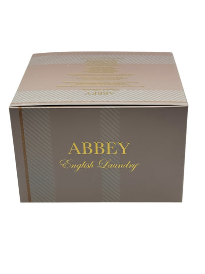 Paradime Enterprise LLC Abbey by English Laundry perfume box in taupe with gold lettering and striped pattern.