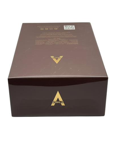 Paradime Enterprise LLC ATRALIA Elixir perfume box in deep brown with gold logo and text on a white background