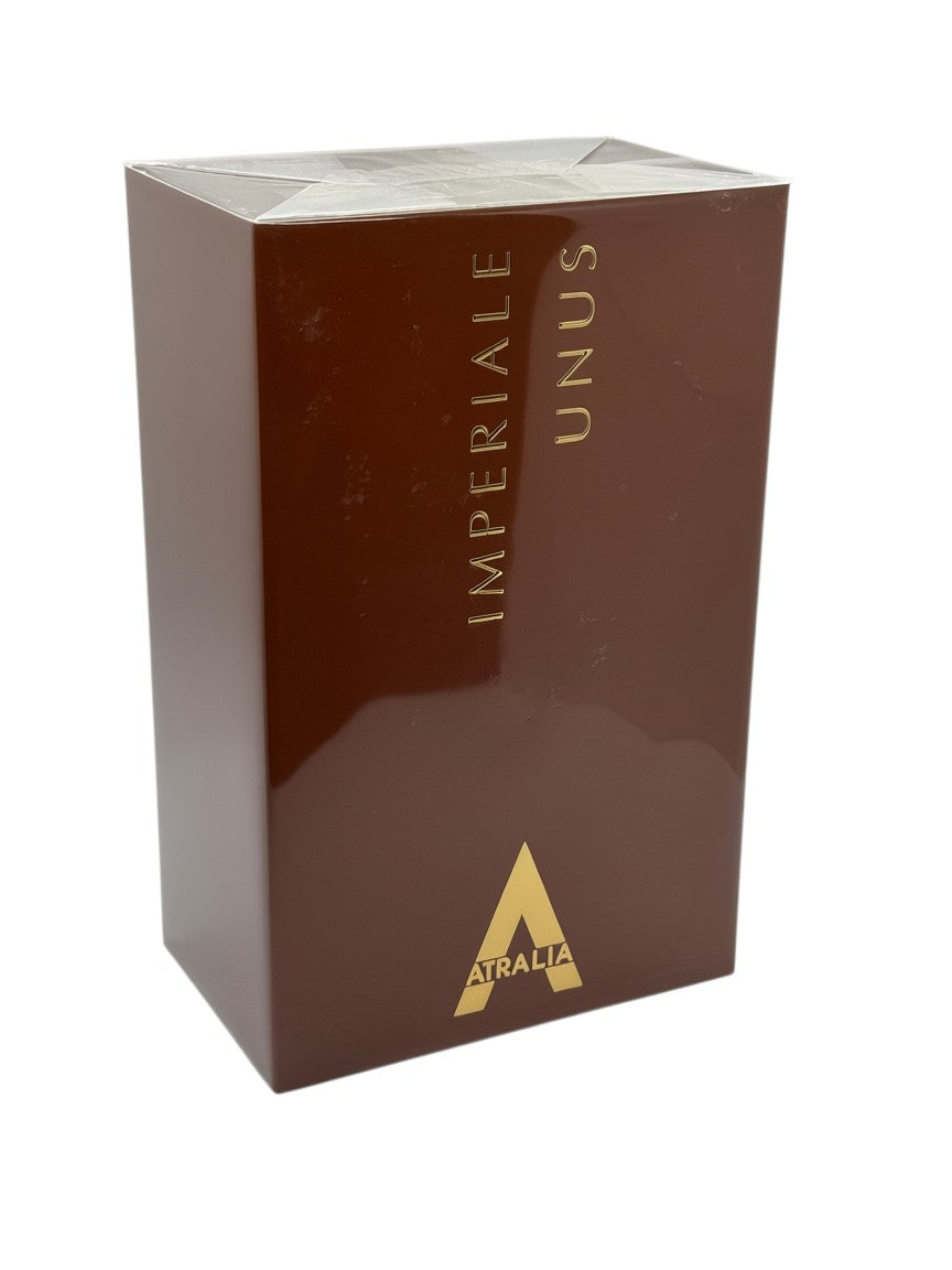 Paradime Enterprise LLC Atralia Imperiale Unus 3.4 oz Eau de Parfum in a glossy dark brown box with gold lettering.