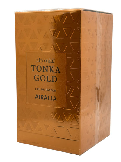 Paradime Enterprise LLC Atralia Tonka Gold Eau de Parfum in a metallic gold box with geometric triangle patterns.
