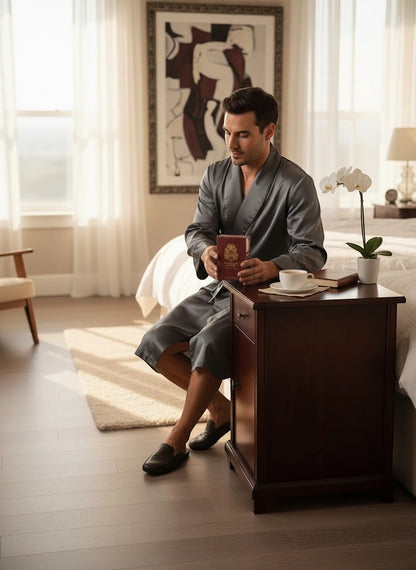 Paradime Enterprise LLC English Laundry Cambridge Knight fragrance bottle held by a man in a silk robe in a bedroom