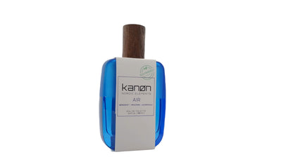 Paradime Enterprise LLC Kanon Elements Air Eau de Toilette in a blue glass bottle with a wooden cap
