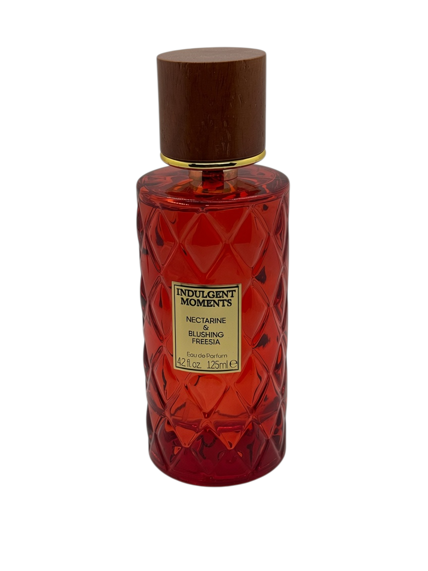 Paradime Enterprise LLC Indulgent Moments Lavender & Honeysuckle EDP in a purple quilted glass bottle with a wood cap.