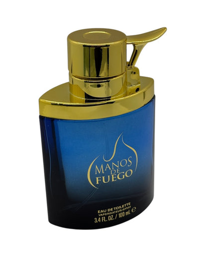Paradime Enterprise LLC Manos De Fuego Macho Man Eau de Toilette in a blue glass bottle with a gold spray cap.