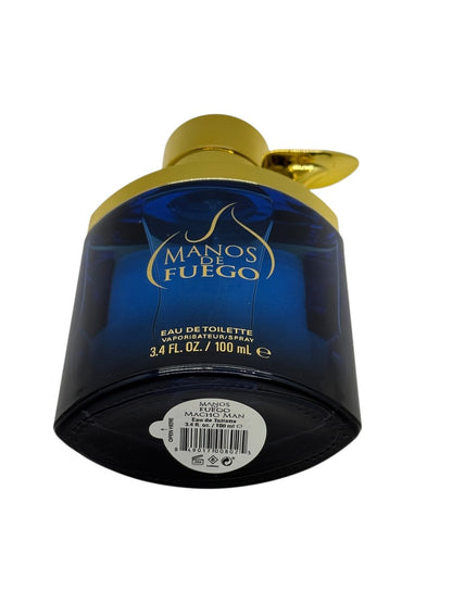 Paradime Enterprise LLC Manos De Fuego Macho Man Eau de Toilette spray in a deep blue glass bottle with gold cap.