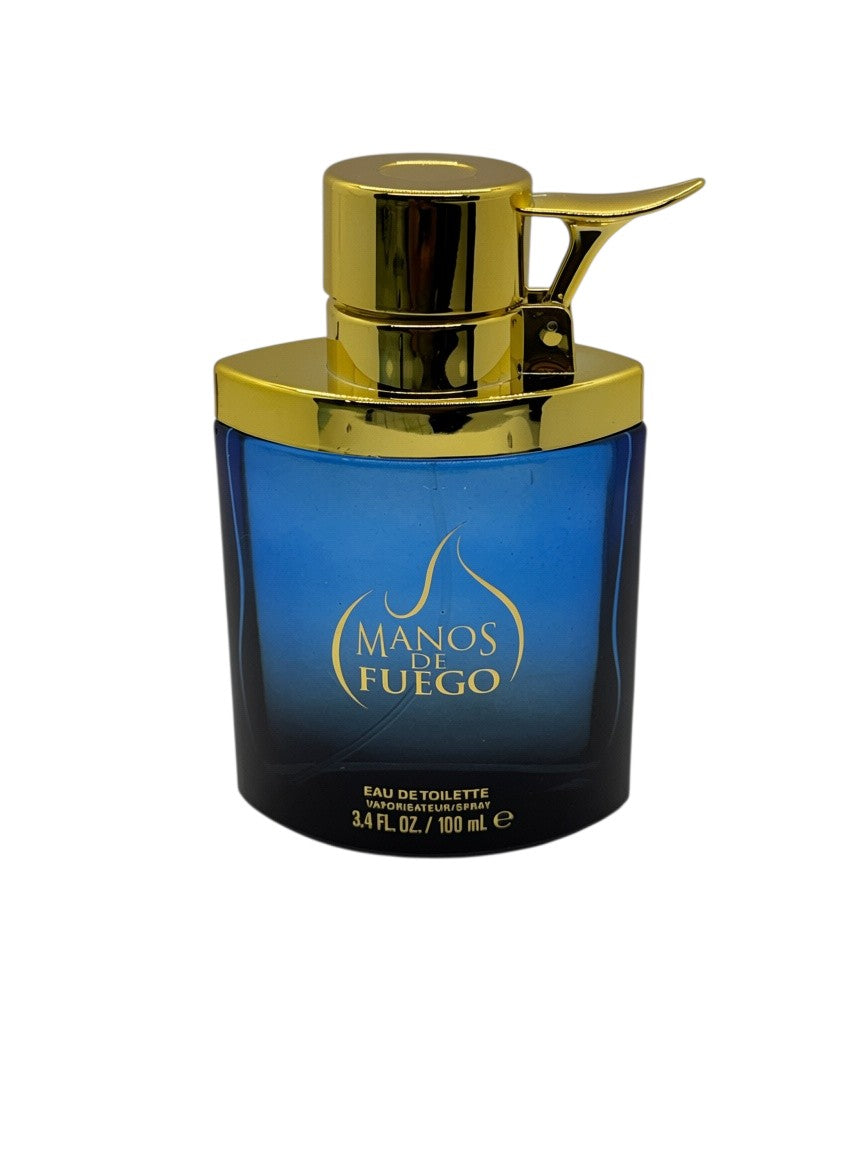 Paradime Enterprise LLC Manos De Fuego Macho Man Eau de Toilette in a blue glass bottle with a gold spray cap.