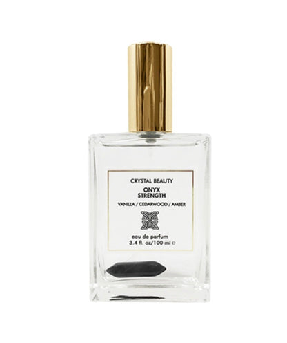 Paradime Enterprise LLC Crystal Beauty Onyx Strength perfume bottle with a black onyx crystal inside and gold cap.