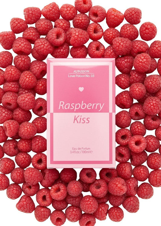 Paradime Enterprise LLC Aubusson Love Potion No. 03 Raspberry Kiss perfume box surrounded by fresh red raspberries.