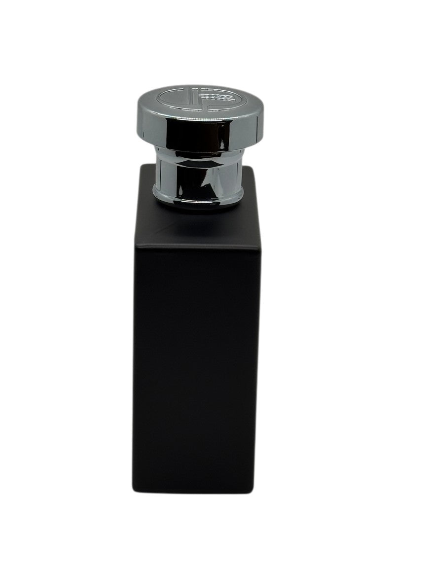 Paradime Enterprise LLC Sergio Tacchini Pure Black eau de toilette in a sleek matte black rectangular bottle with a silver cap