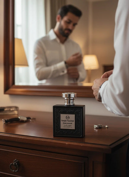 Paradime Enterprise LLC Sergio Tacchini Pure Black eau de toilette bottle on a wooden dresser with a man in mirror