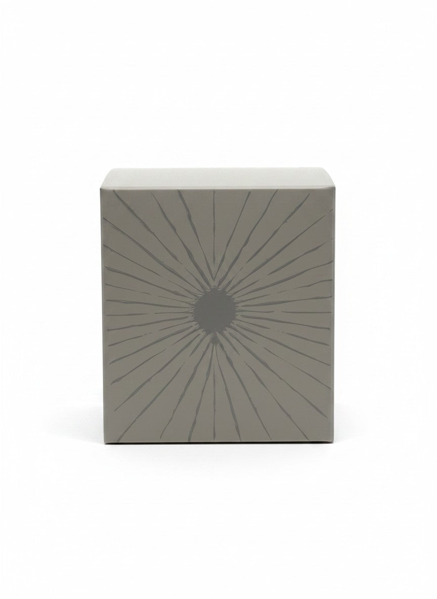 Paradime Enterprise LLC TOVA Beverly Hills candle box in grey with a sunburst graphic design on a white background
