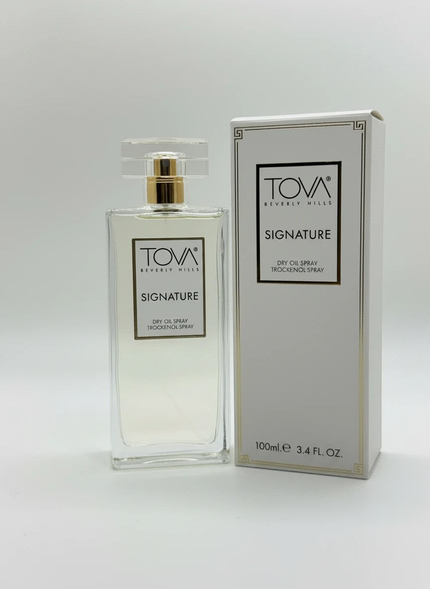 Paradime Enterprise LLC Tova Signature dry oil spray bottle and white box packaging on a clean white background.
