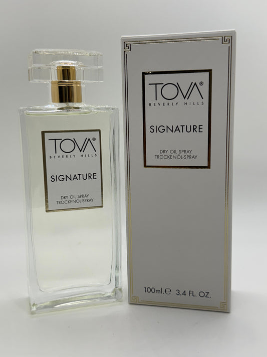 Paradime Enterprise LLC Tova Signature dry oil spray bottle and white packaging box on a white background.